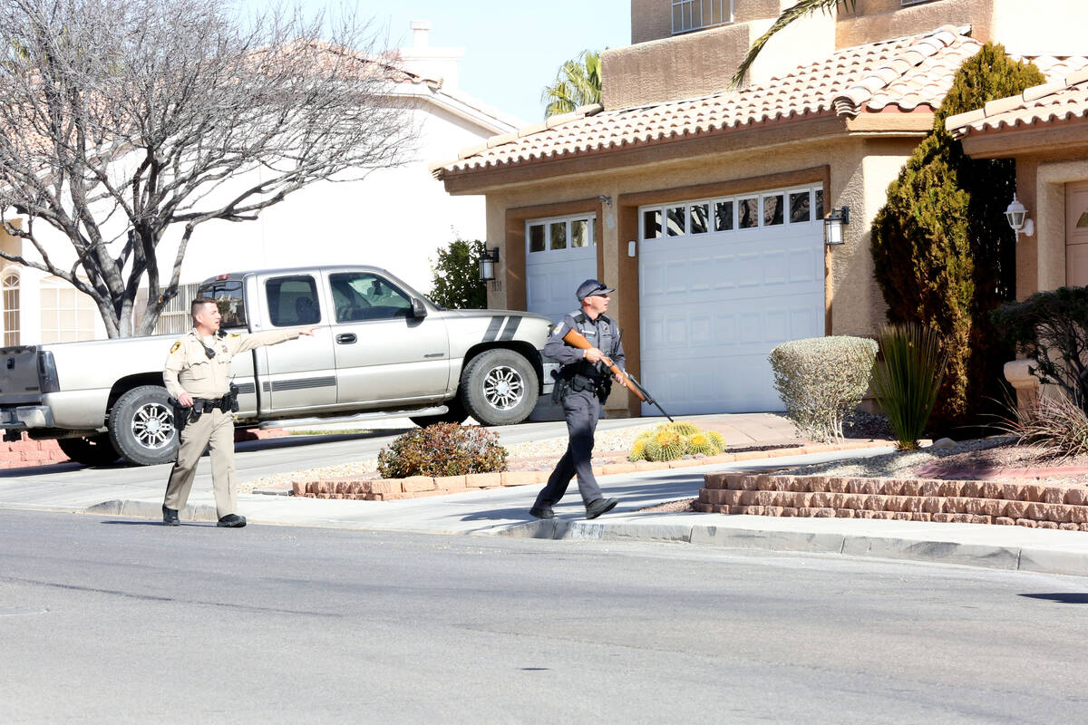 A Las Vegas Metropolitan Police officer and a game warden from the Nevada Department of Wildlif ...