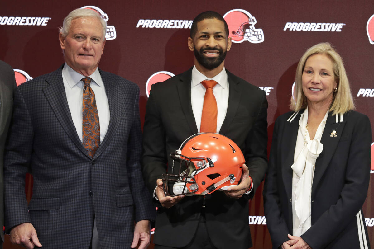 FILE - In this Feb. 5, 2020, file photo, Cleveland Browns general manager Andrew Berry, center, ...