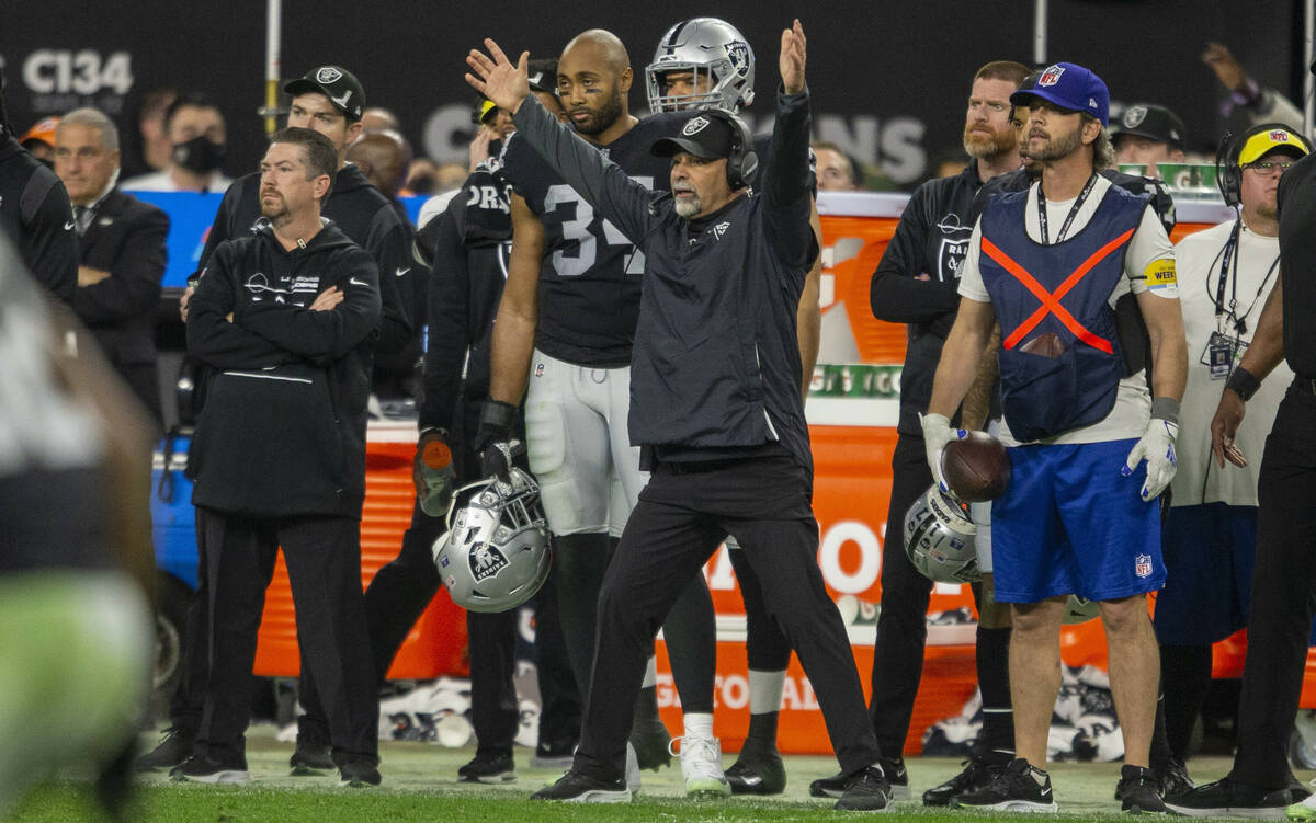 Raiders interim head coach Rich Bisaccia reacts as the Los Angeles Chargers drive down field in ...