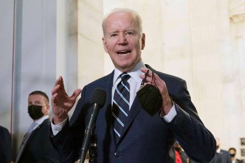 President Joe Biden speaks to the media after meeting privately with Senate Democrats, Thursday ...