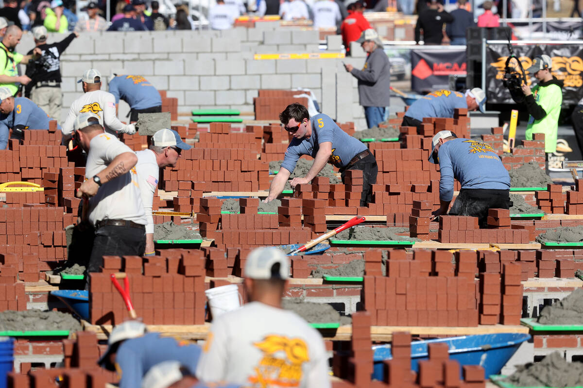 Masons, including Behrant Miller (5) of East Central Masonry in Harris, Minn., compete in the B ...