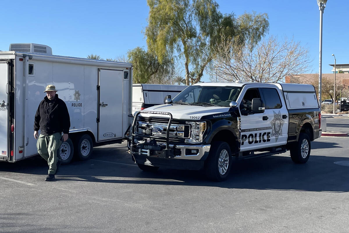 North Las Vegas police detectives called on a dive team to assist in a search for “evidence f ...