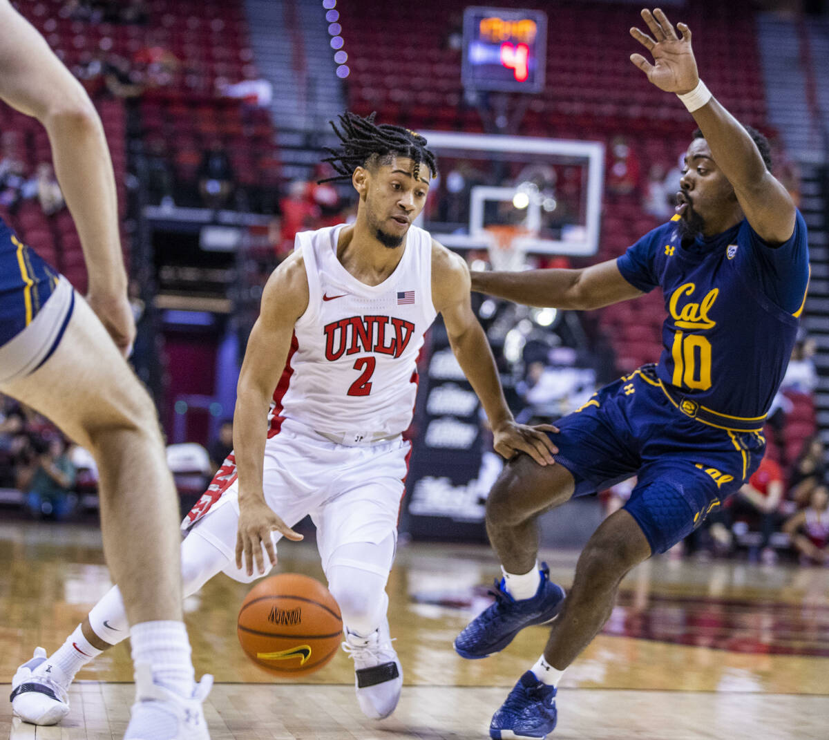 UNLV Rebels guard Justin Webster (2) looks to drive the lane past California Golden Bears guard ...