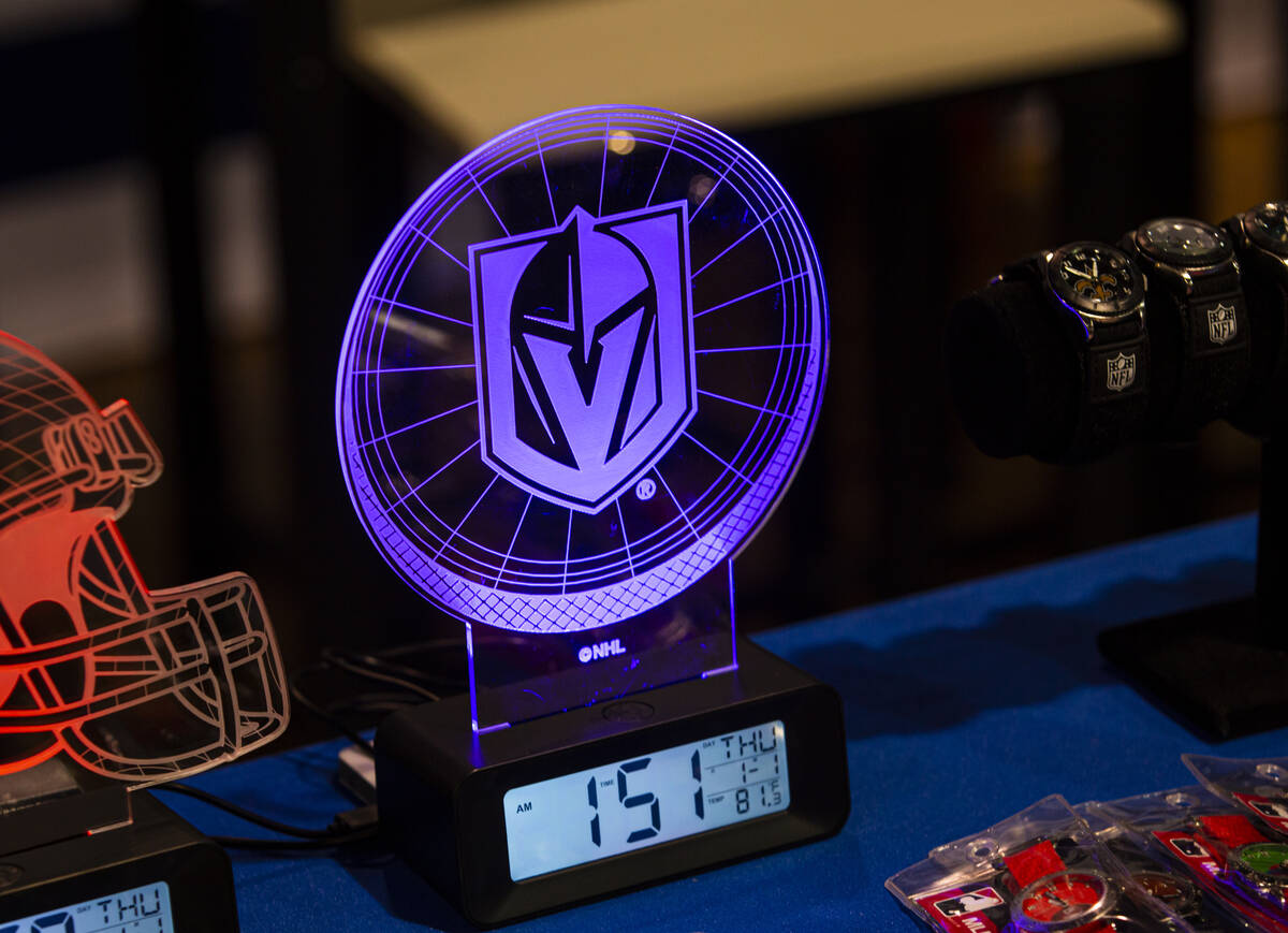 A Golden Knights clock is seen at the Game Time booth during the Sports Licensing & Tailgat ...
