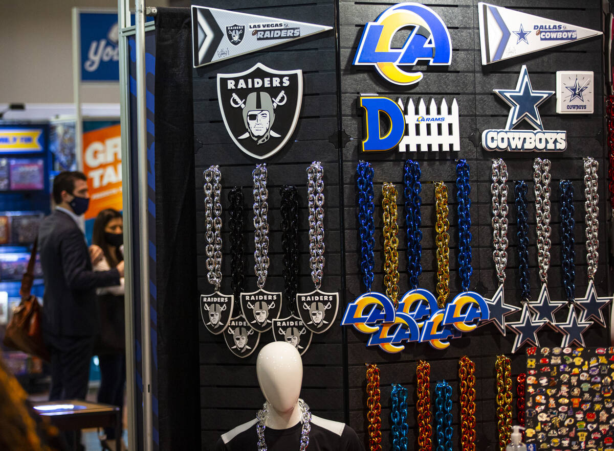 Raiders, Los Angeles Rams and Dallas Cowboys items are seen during the Sports Licensing & T ...
