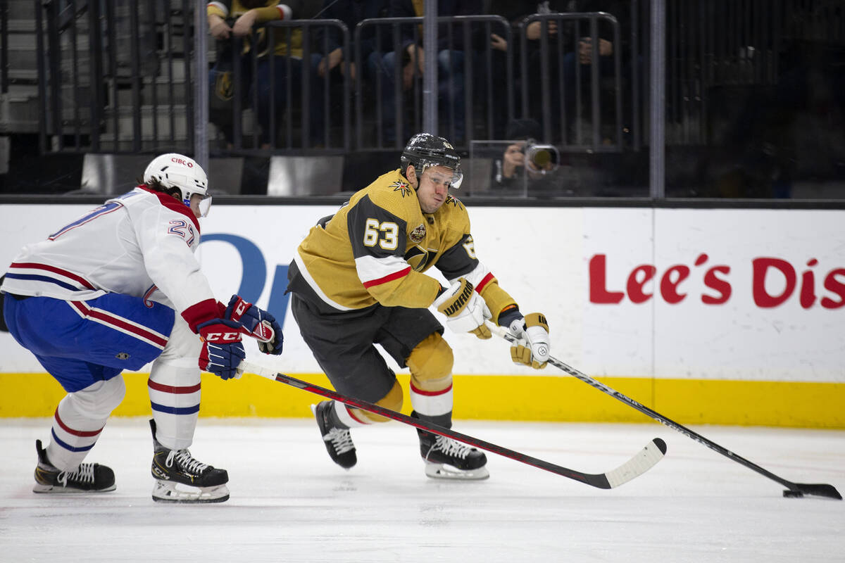 Golden Knights right wing Evgenii Dadonov (63) skates to take a shot on goal while Canadiens de ...