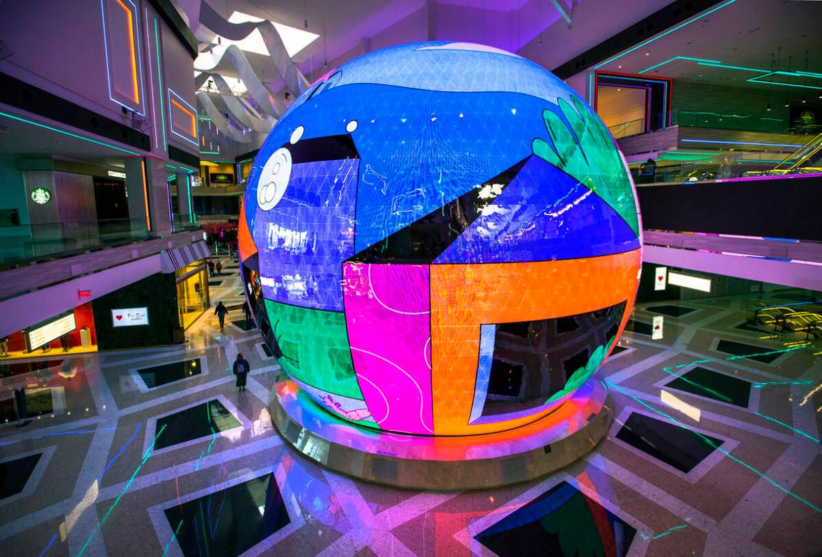 Glow presented by Resorts World Las Vegas takes to the 50-foot interior globe, the hourly show ...