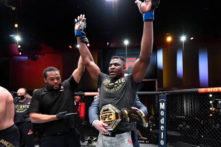 Francis Ngannou of Cameroon reacts after his victory over Stipe Miocic in their UFC heavyweight ...