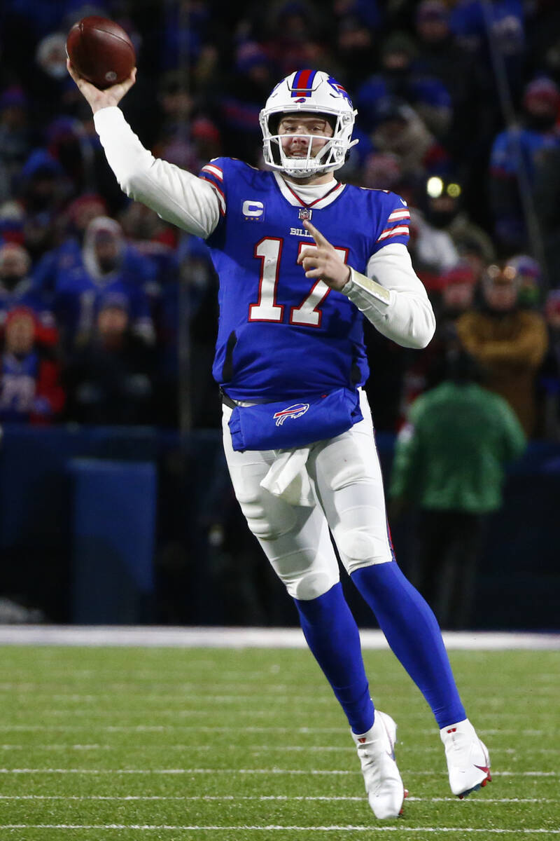 Buffalo Bills quarterback Josh Allen (17) throws a pass during the second half of an NFL wild-c ...