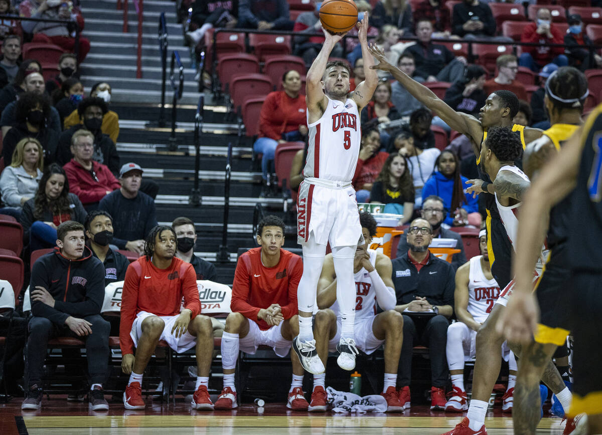 UNLV Rebels guard Jordan McCabe (5) elevates for another three-point basket as San Jose State S ...