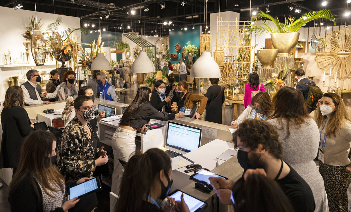 Shoppers browse at Accent Decor during the Las Vegas Market at World Market Center Las Vegas on ...