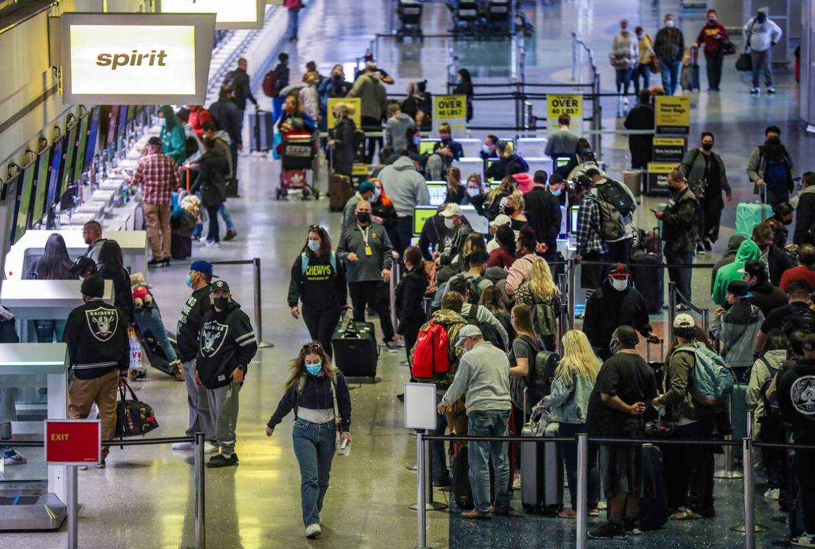 Guests in the ticketing area of Harry Reid International Airport on Monday, Jan. 10, 2022 in La ...