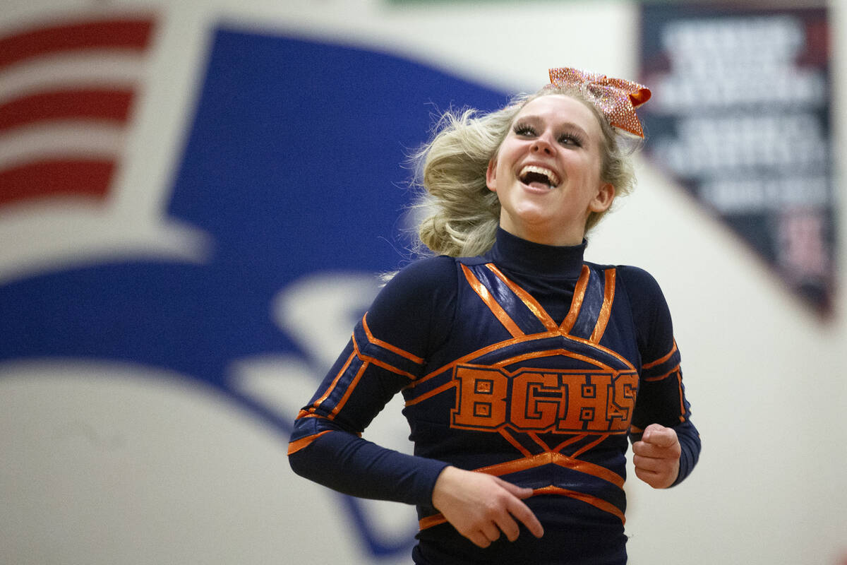 Bishop Gorman cheerleader Ariel Dixon runs to the sidelines after a backflip contest against Li ...