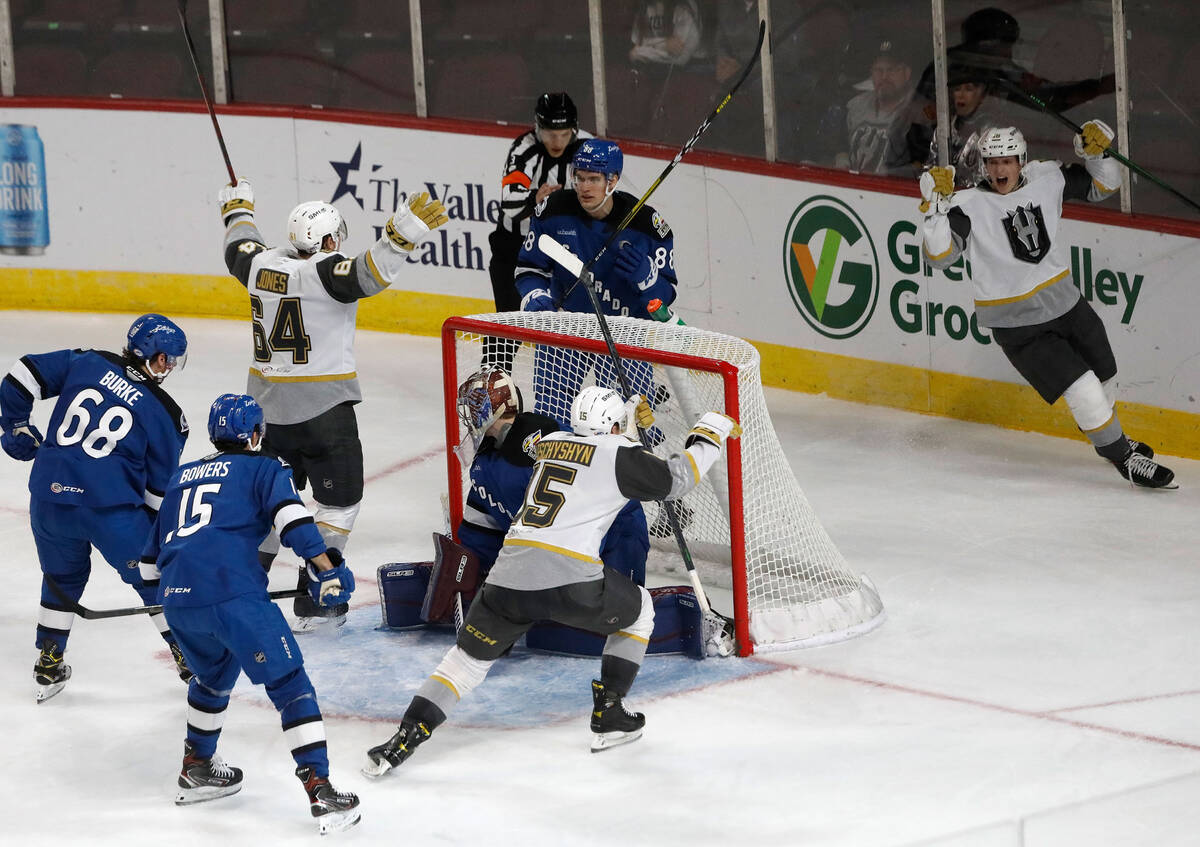 Henderson Silver Knights center Jake Leschyshyn (15) celebrates his goal against Colorado Eagle ...