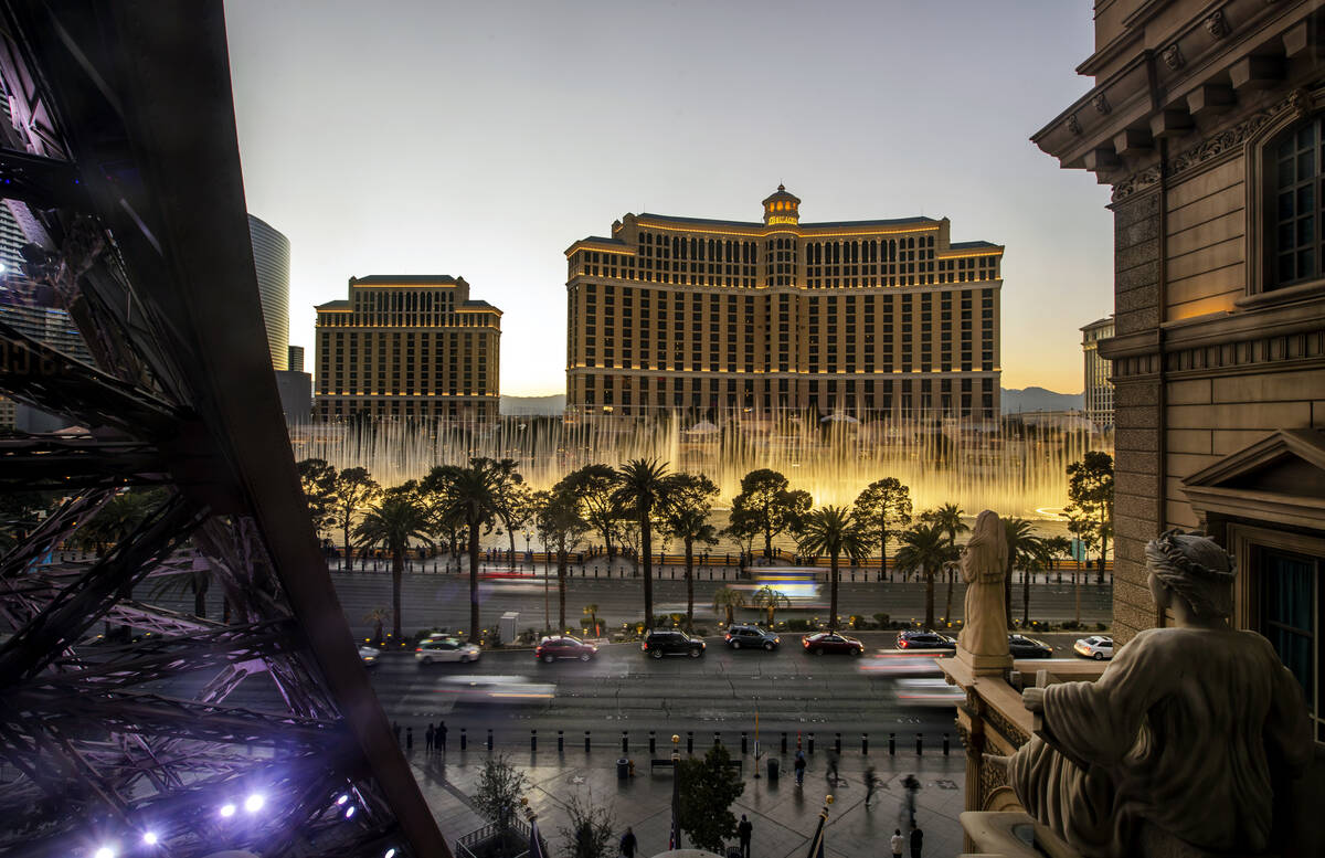 Bellagio Fountains and exterior with the Strip as seen from the Chateau Rooftop at Paris Las Ve ...