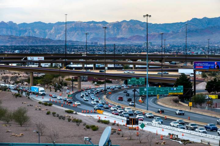 Motorists slowly merge into traffic on the U.S. 95 South near the North Casino Center Boulevard ...