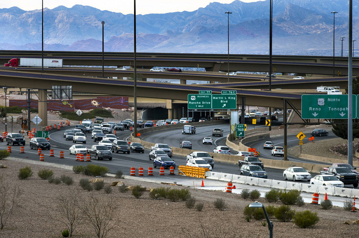 Motorists slowly merge into traffic on the U.S. 95 South near the North Casino Center Boulevard ...