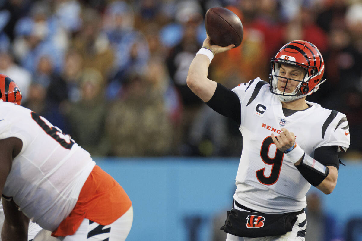 Cincinnati Bengals quarterback Joe Burrow (9) passes the ball against the Tennessee Titans duri ...