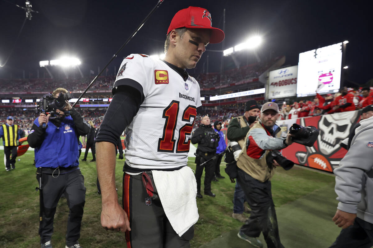 Tampa Bay Buccaneers quarterback Tom Brady (12) reacts as he leaves the field after the team lo ...