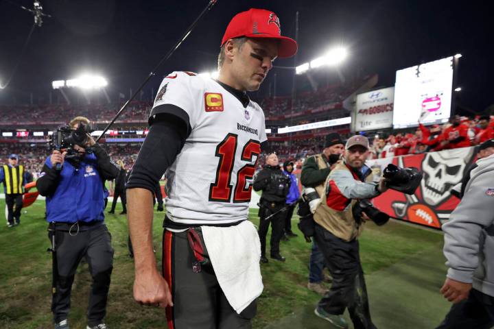 Tampa Bay Buccaneers quarterback Tom Brady (12) reacts as he leaves the field after the team lo ...