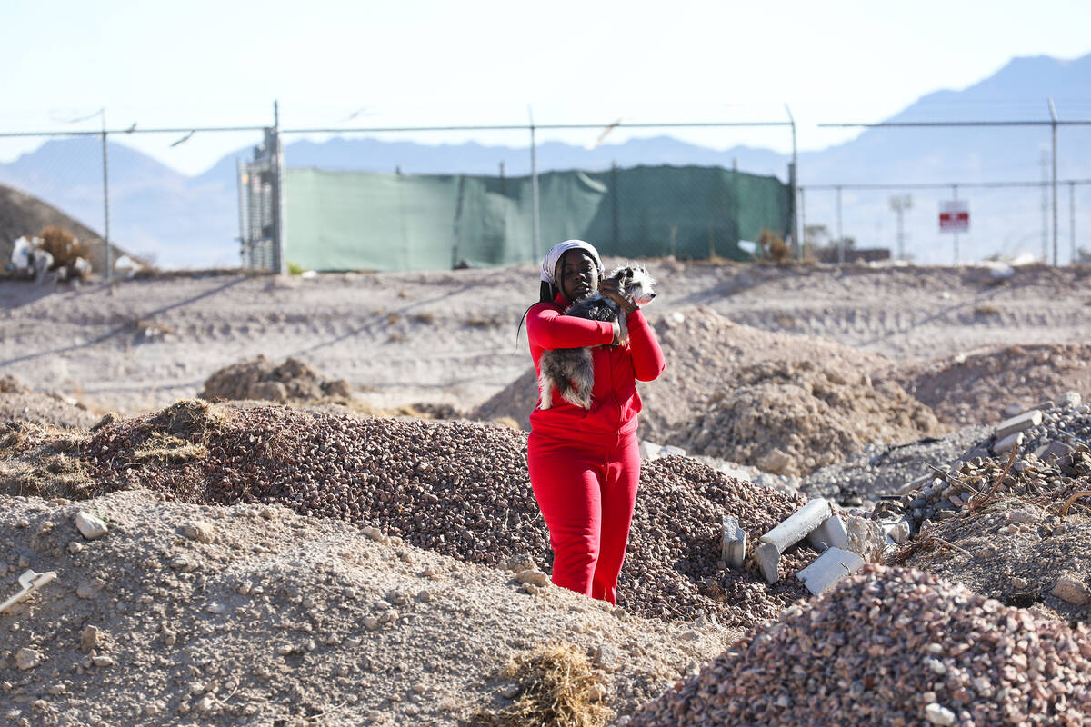 Z’kya Smith, 15, carries her cousin’s dog Magic on Sunday, Jan. 30, 2022 in North ...