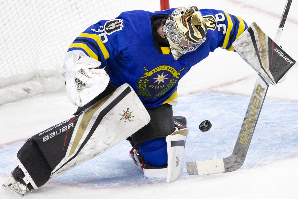 Henderson Silver Knights goaltender Logan Thompson (36) is about to make a save during the thir ...