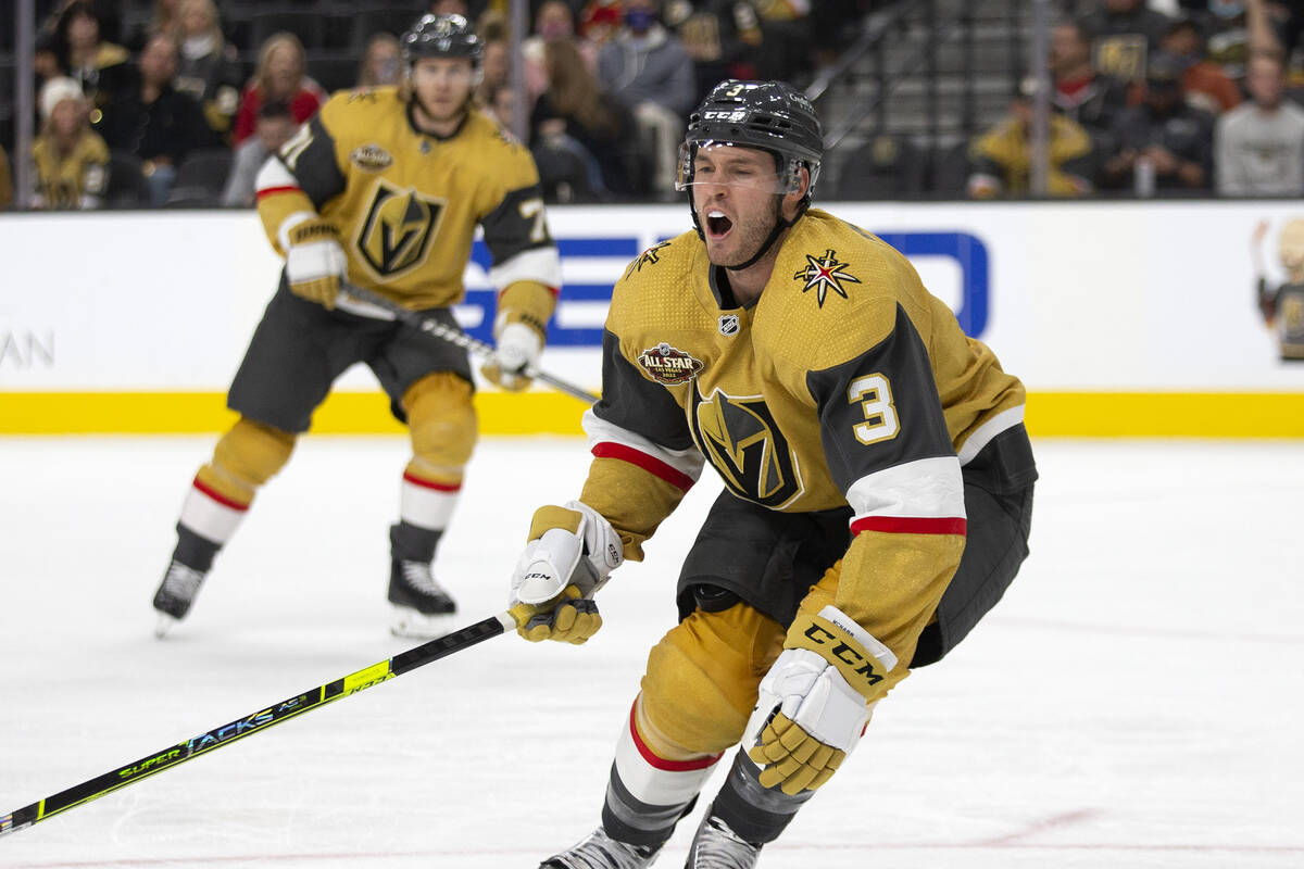 Golden Knights defenseman Brayden McNabb (3) falls to the ice in pain during the second period ...