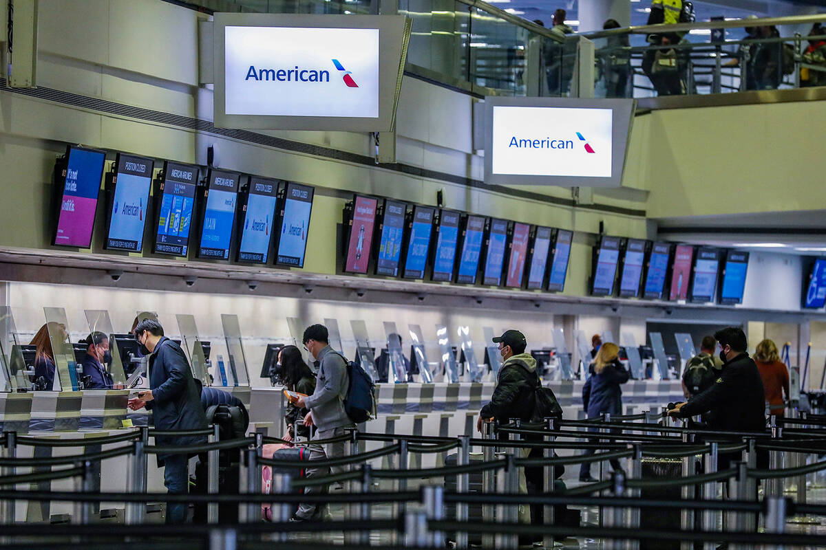 Guests in the ticketing area of Harry Reid International Airport on Monday, Jan. 10, 2022 in La ...