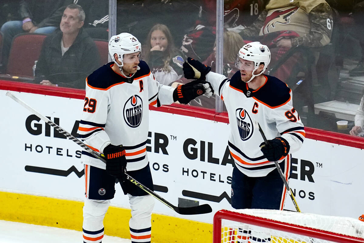 Edmonton Oilers center Leon Draisaitl (29) celebrates his goal against the Arizona Coyotes with ...