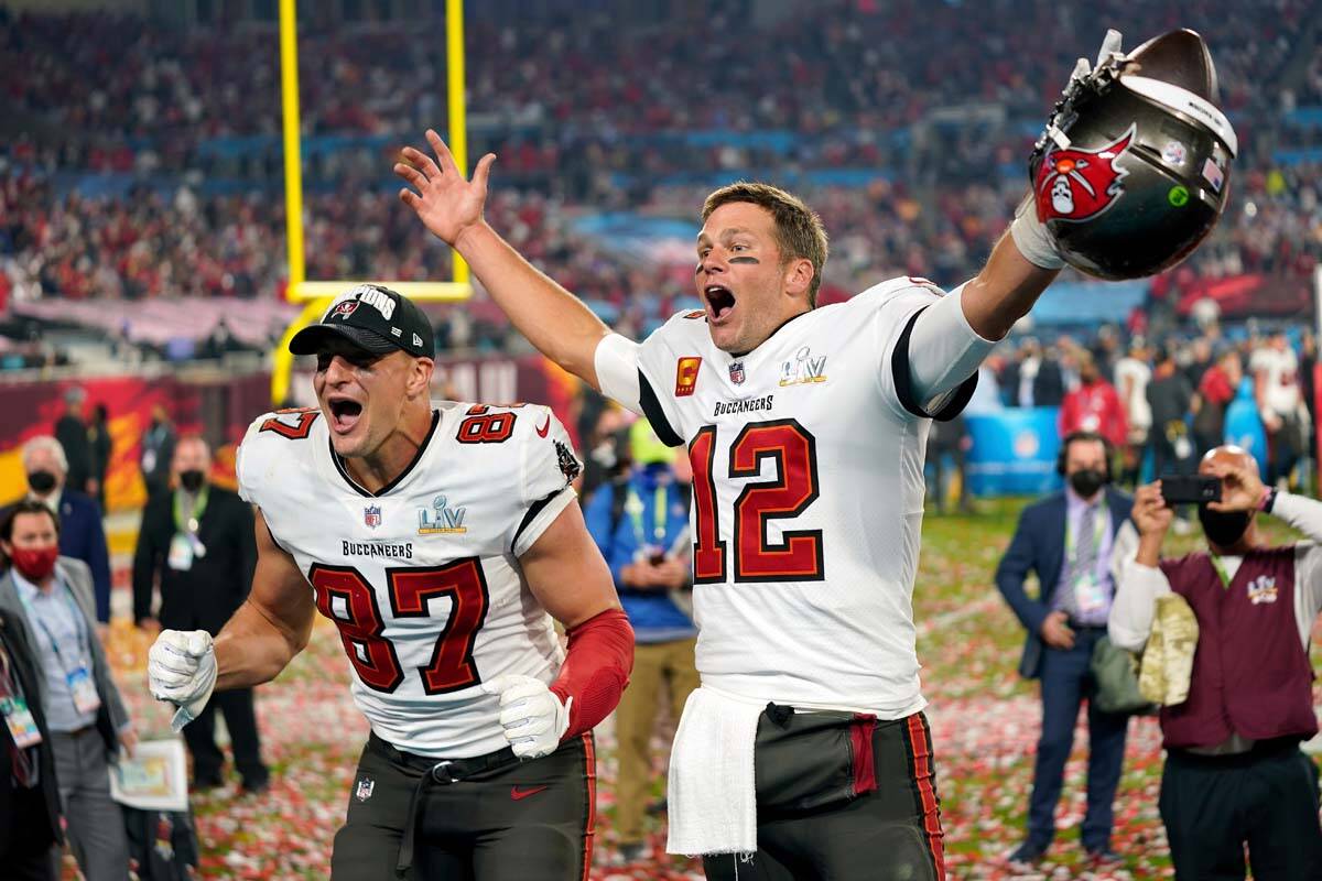 Tampa Bay Buccaneers tight end Rob Gronkowski, left, and quarterback Tom Brady (12) celebrate a ...