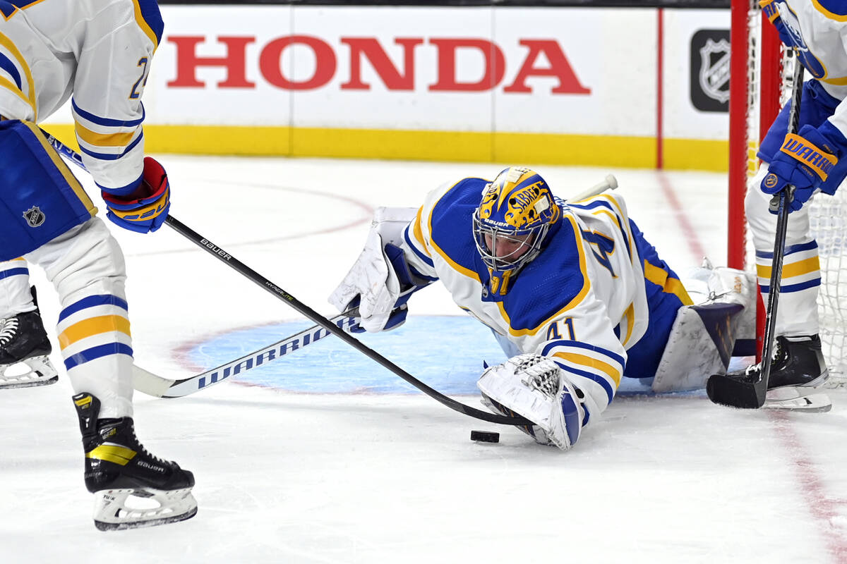 Buffalo Sabres goaltender Craig Anderson (41) reaches to cover the puck during the second perio ...