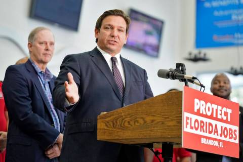 Florida Gov. Ron DeSantis speaks to supporters and members of the media after a bill signing Th ...