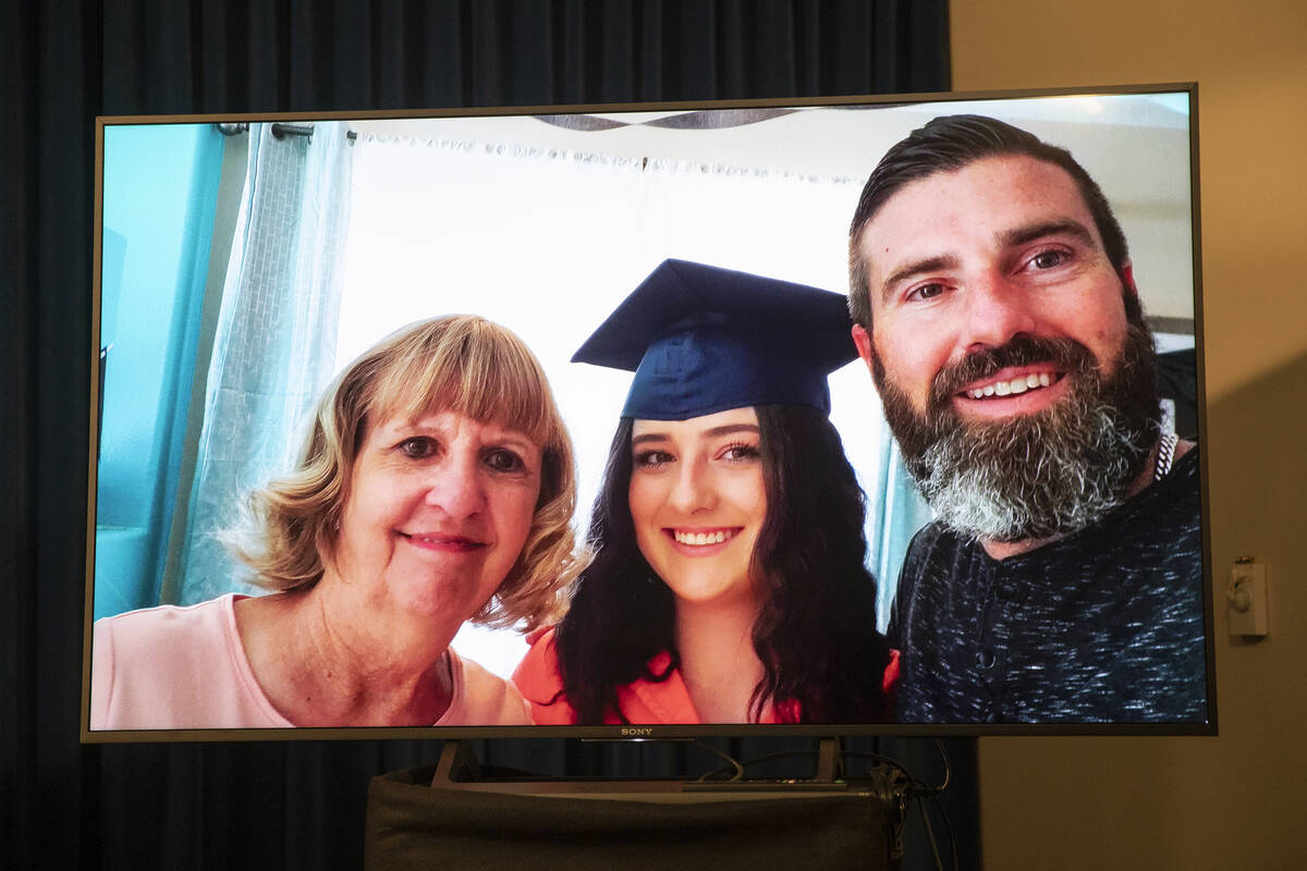 A photo of 17-year-old Mia Gugino, center, who died from a fentanyl overdose, is displayed in a ...