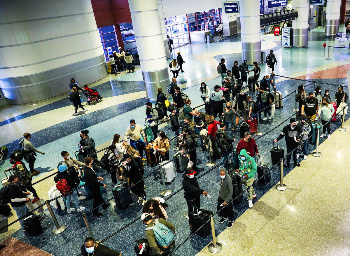 Guests in the ticketing area of Harry Reid International Airport on Monday, Jan. 10, 2022 in La ...