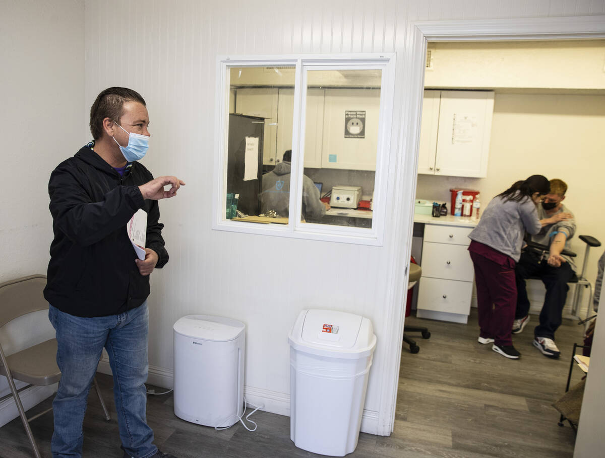 Mike Swecker, founder of the CARE Complex, leads a tour of the homeless services on Monday, Feb ...