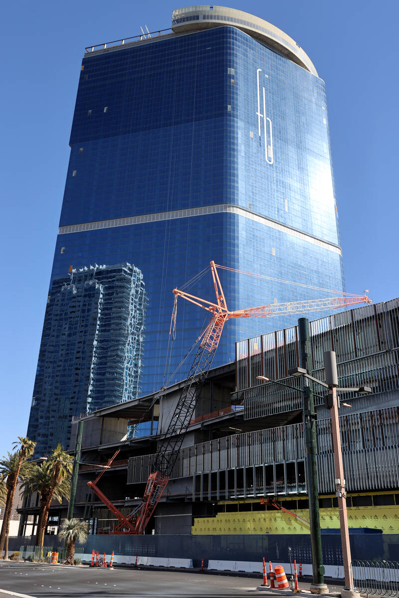 A crane works at the under construction Fontainebleau Las Vegas on the north Strip Friday, Feb. ...