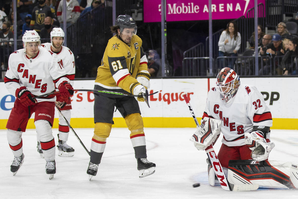 Golden Knights right wing Mark Stone (61) shoots on Carolina Hurricanes goaltender Antti Raanta ...