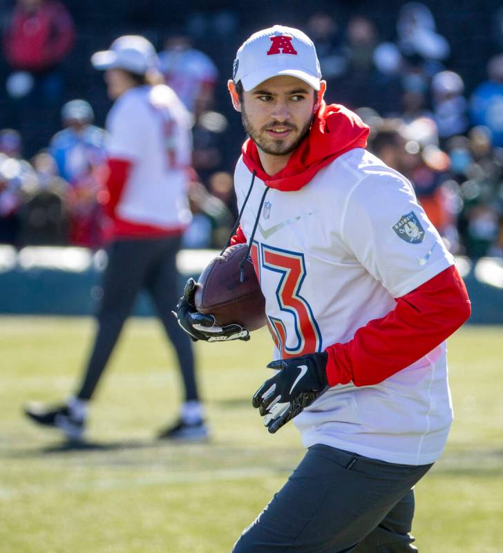 Raiders wide receiver Hunter Renfrow runs after catching a pass during AFC Pro Bowl team practi ...