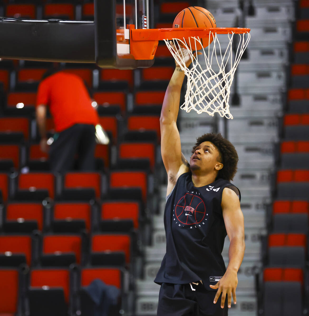 In this Oct. 14, 2021, file photo, UNLV's Cameron Burist (34) lays up the ball during an open b ...