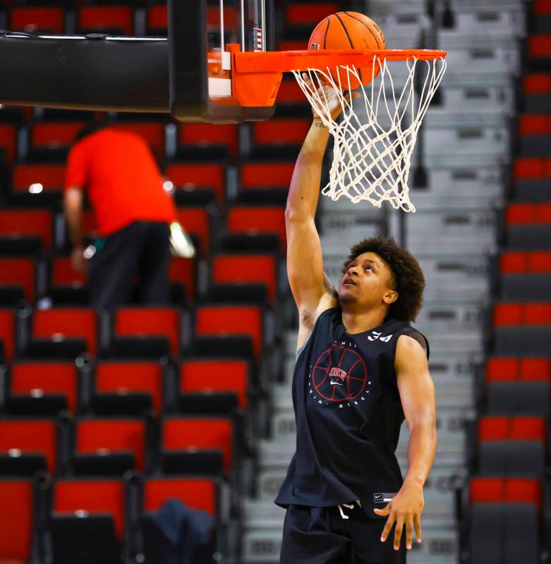 In this Oct. 14, 2021, file photo, UNLV's Cameron Burist (34) lays up the ball during an open b ...