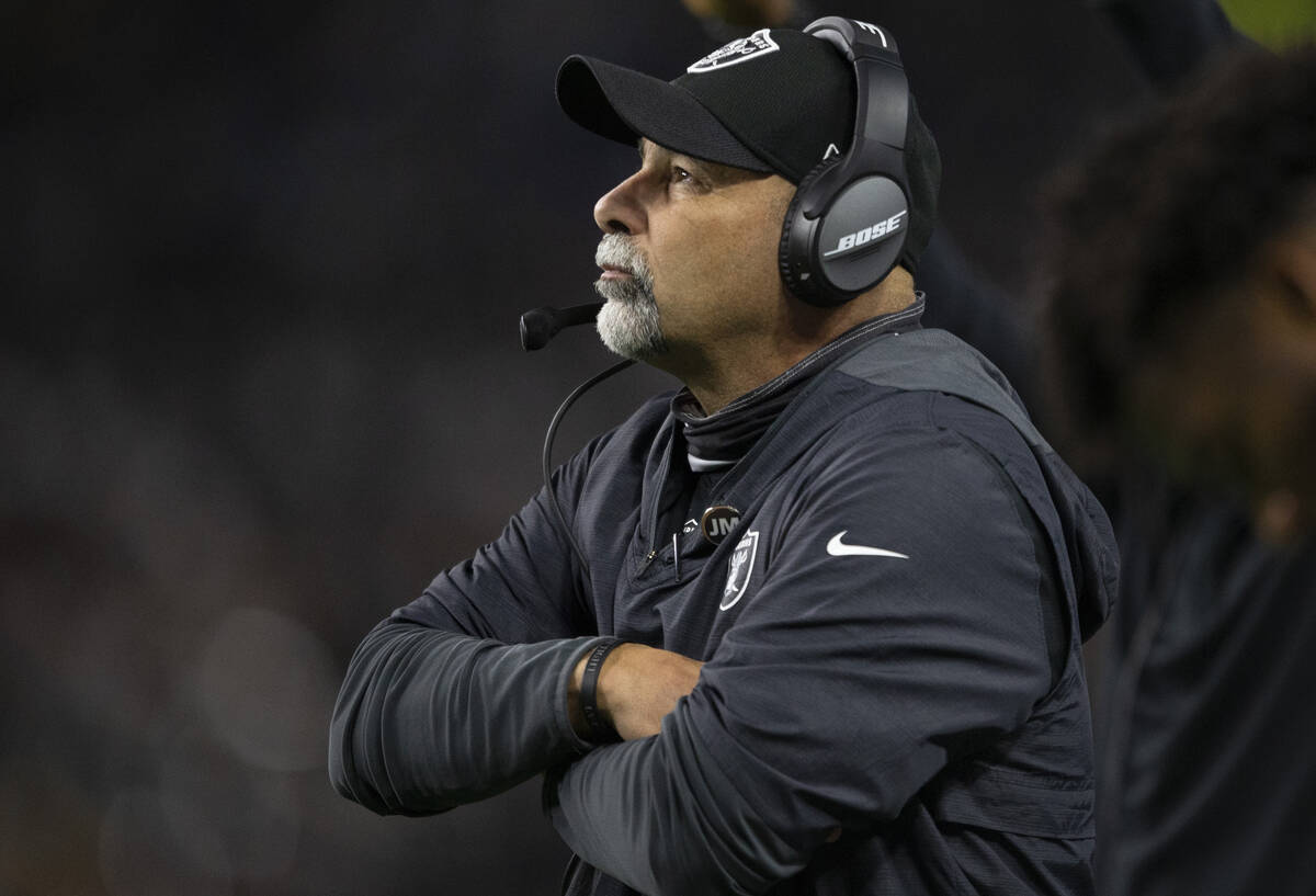 Raiders interim head coach Rich Bisaccia looks to the scoreboard from the sideline during the f ...