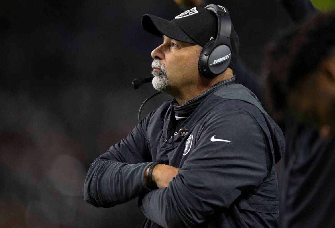 Raiders interim head coach Rich Bisaccia looks to the scoreboard from the sideline during the f ...