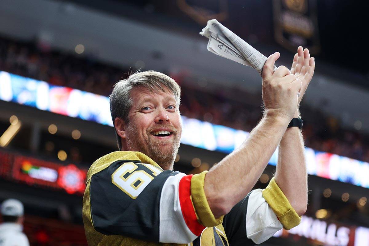 A fan attends the NHL All-Star Skills competition at T-Mobile Arena in Las Vegas, Friday, Feb. ...