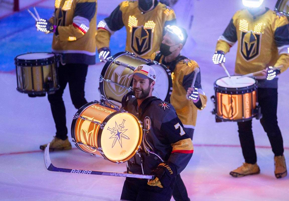 Golden Knights defenseman Alex Pietrangelo (7) participates with the Drumbots LED Drummers&#xa0 ...