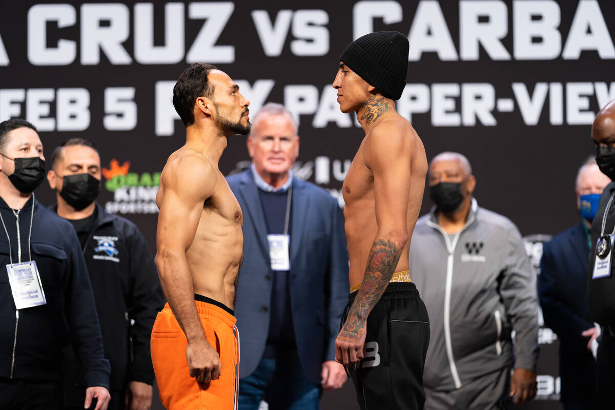 Keith Thurman, left, and Mario Barrios pose during Friday's weigh-in at Michelob Ultra Arena. P ...