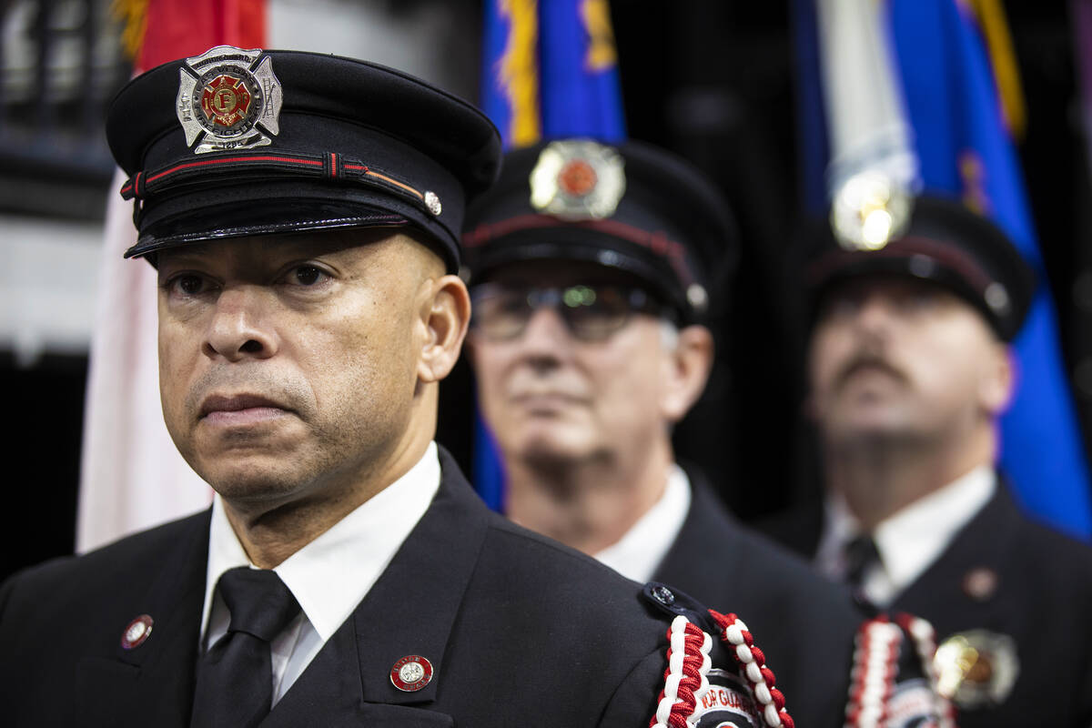 The honor guard waits to take the ice before the start of the NHL All-Star Game on Saturday, Fe ...