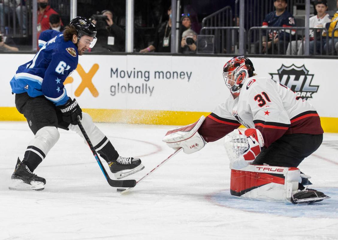 Vegas Golden Knights forward Mark Stone (61) shoots on Carolina Hurricanes goaltender Frederik ...