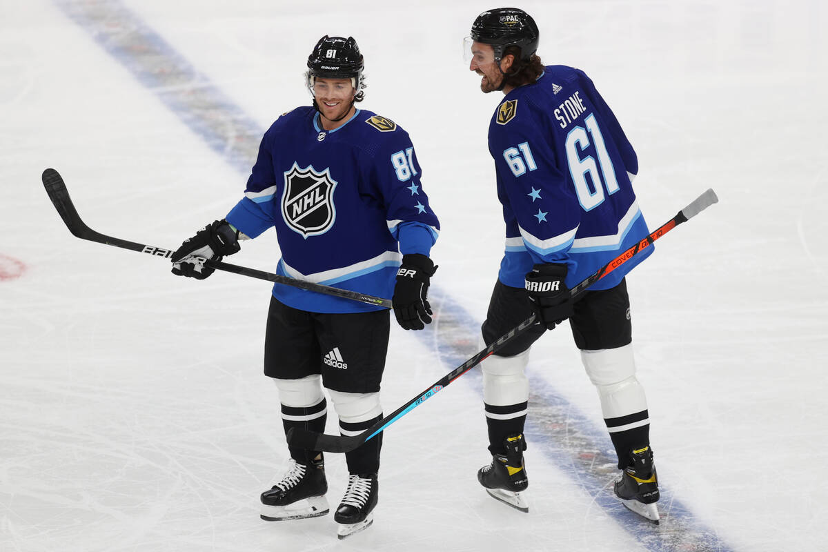 Vegas Golden Knights forward Jonathan Marchessault (81) reacts after scoring a goal, with forwa ...