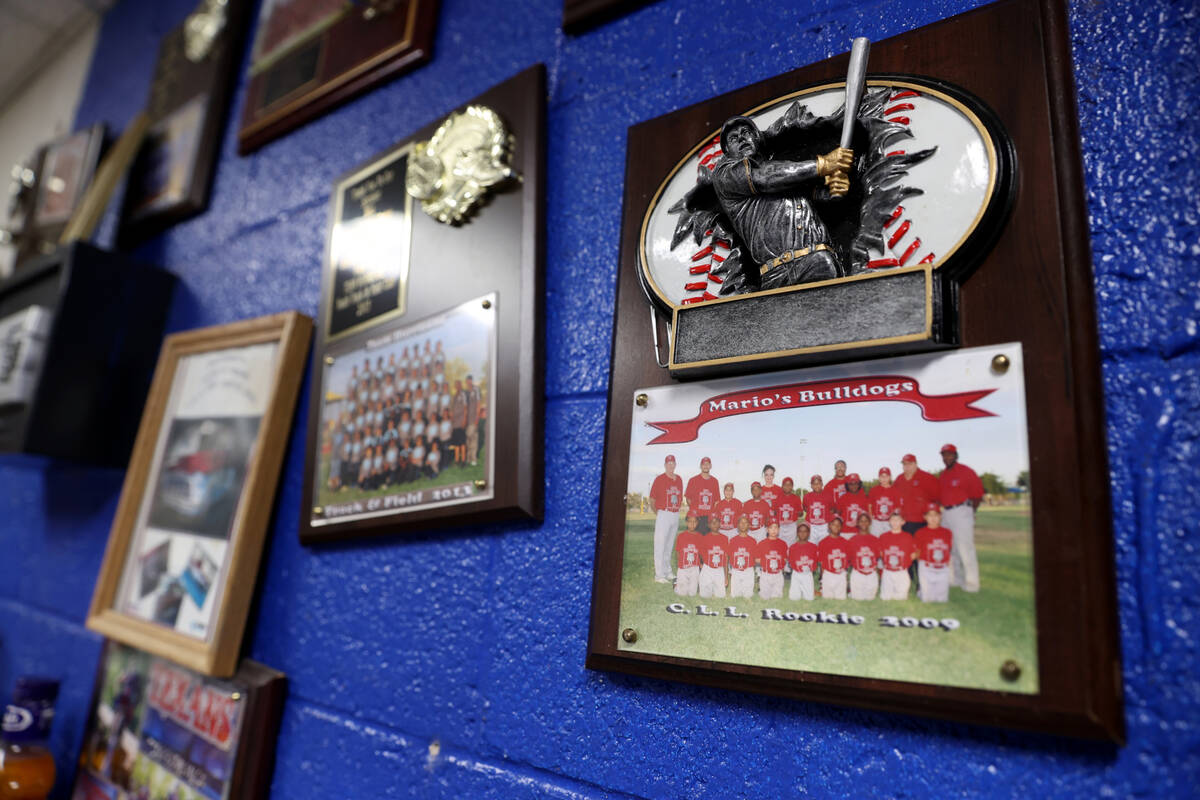 Youth baseball plaques in the office of Mario Berlanga, Jr., president of Mario's Westside Mark ...