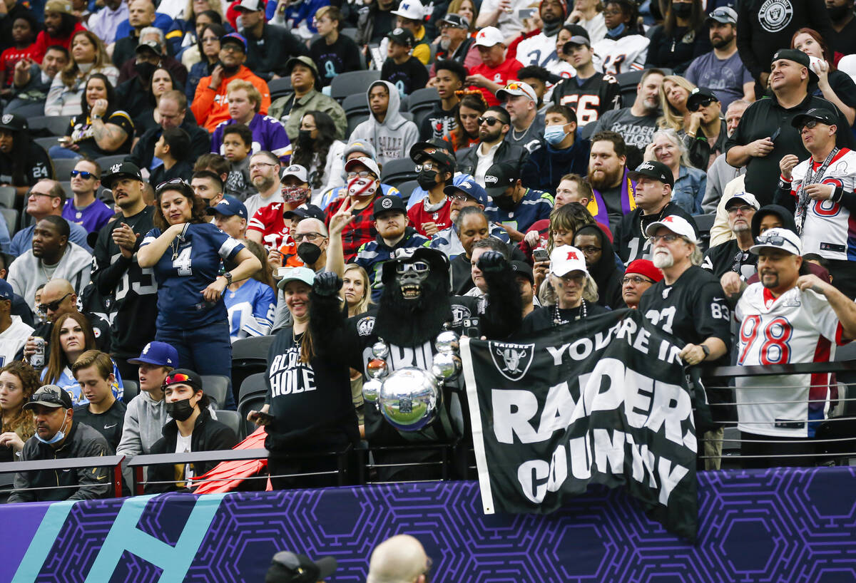 Football fans cheer during the first half of the NFL Pro Bowl football game at Allegiant Stadiu ...